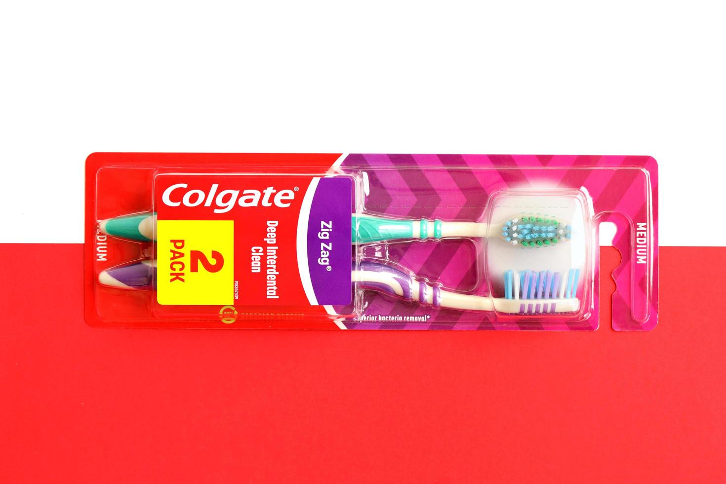 TERNOPIL, UKRAINE - JUNE 23, 2022 Colgate toothbrushes, a brand of oral hygiene products manufactured by American consumer-goods company Colgate-Palmolive photo