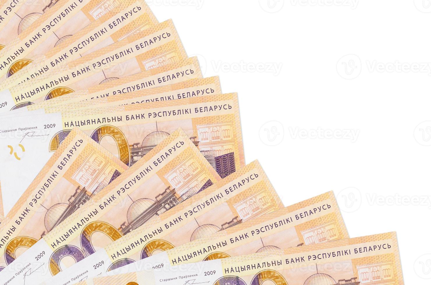 20 Belorussian rubles bills lies isolated on white background with copy space stacked in fan close up photo