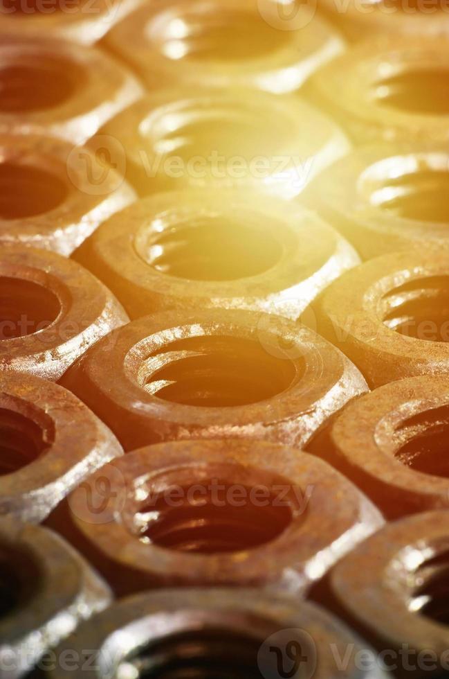 Close-up of rusty nuts photo