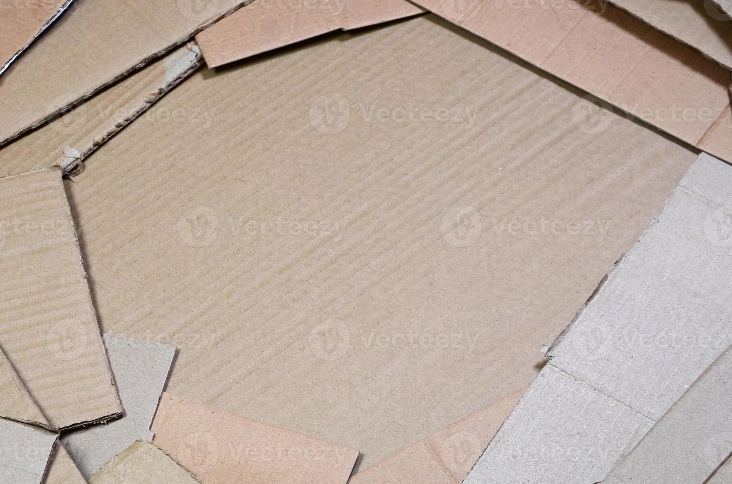 Background of paper textures piled ready to recycle. A pack of old office cardboard for recycling of waste paper. Pile of wastepaper photo