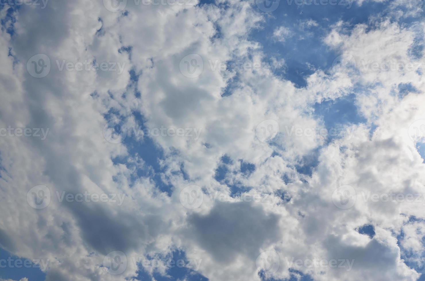 Beautiful blue sky background template with some space for input text message below isolated on blue photo