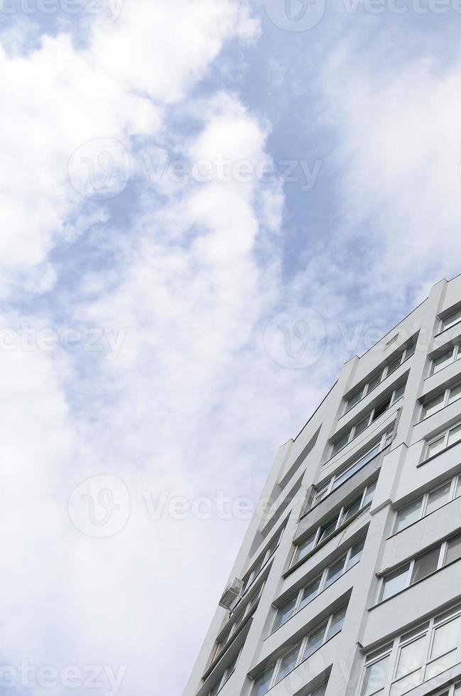 New multy storey residential building and blue sky photo