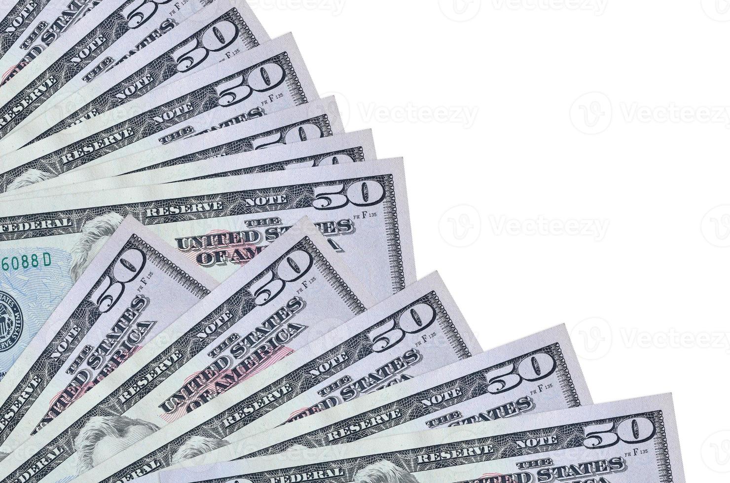 50 US dollars bills lies isolated on white background with copy space stacked in fan close up photo