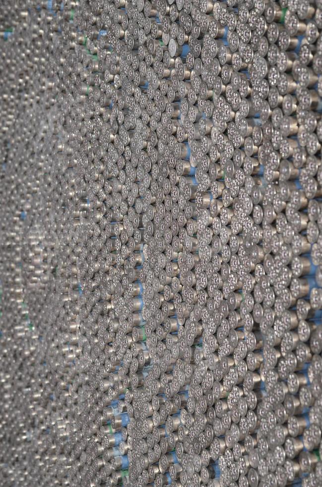 Pattern of 12 gauge cartridges for shotgun bullets. Shells for hunting rifle close up. Backdrop for shooting range or ammunition trade concepts photo
