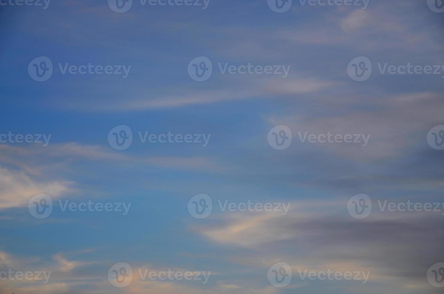 A photo of a bright and shiny blue sky with fluffy and dense white clouds