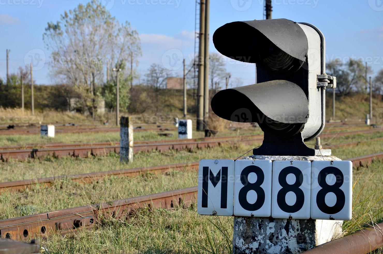 Railroad sign with the railway background photo