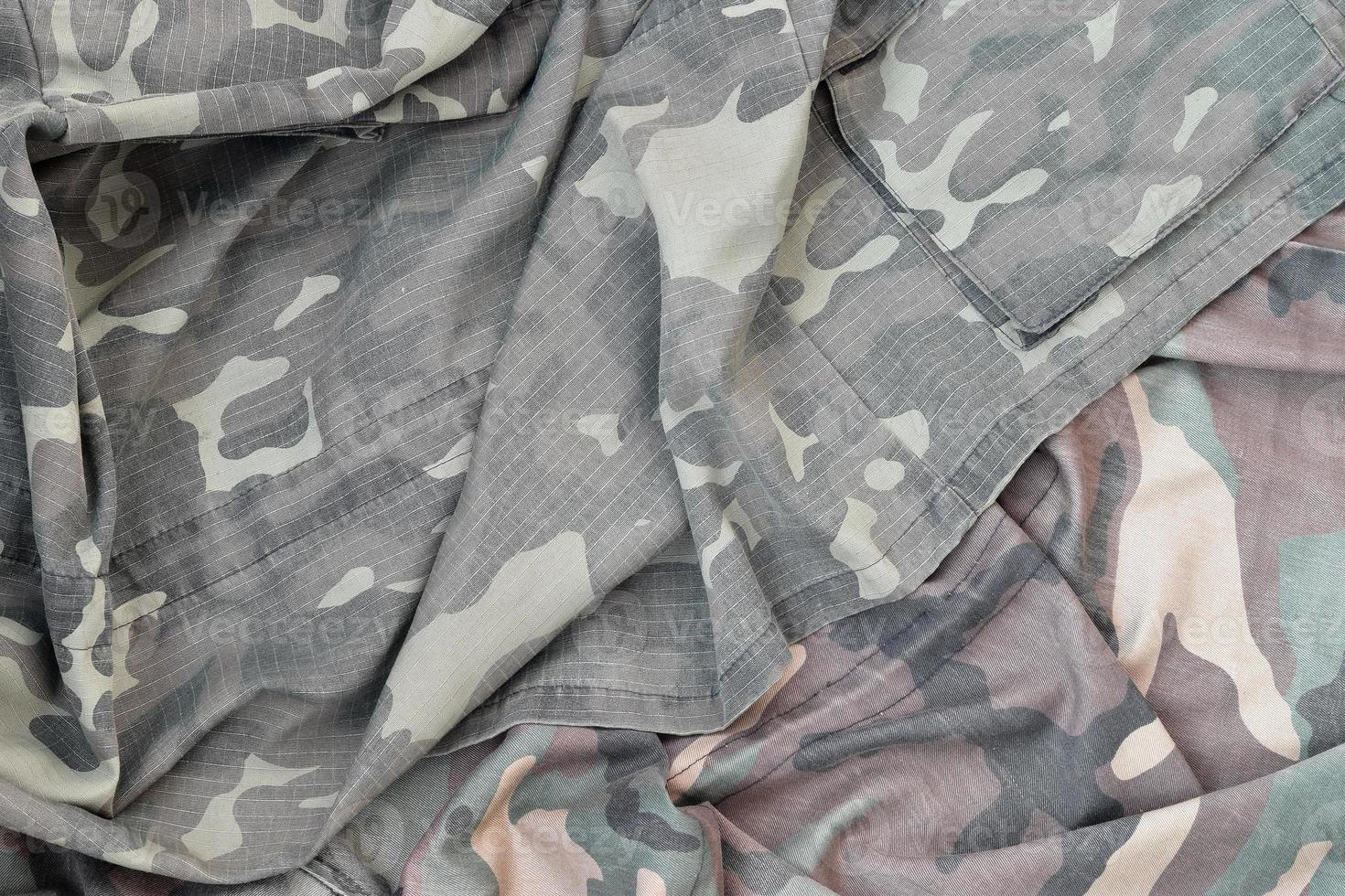 Camouflage background texture as backdrop for stalking and Chernobyl exclusion zone design projects photo