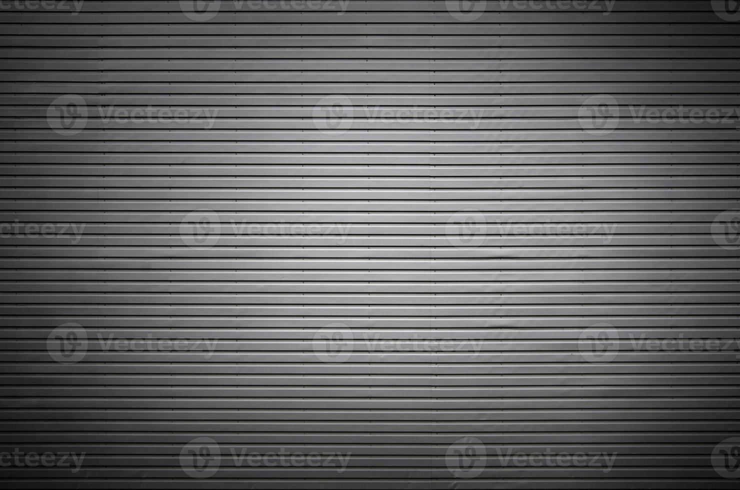 Metal wall with invisible light sources that illuminate the middle for product placement photo