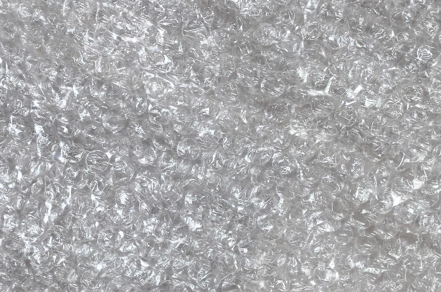 White bubble Wrap Packing Or Air Cushion material. Abstract Texture For Creative Art Work, Close Up dfckground, Top View with Copy Space photo