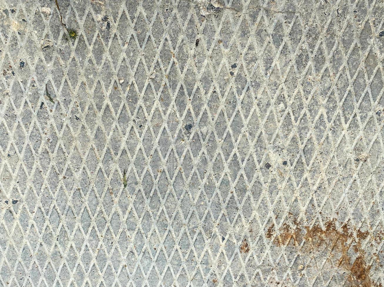 Industrial iron rusty metal surface with rhombuses anti slip background, texture photo