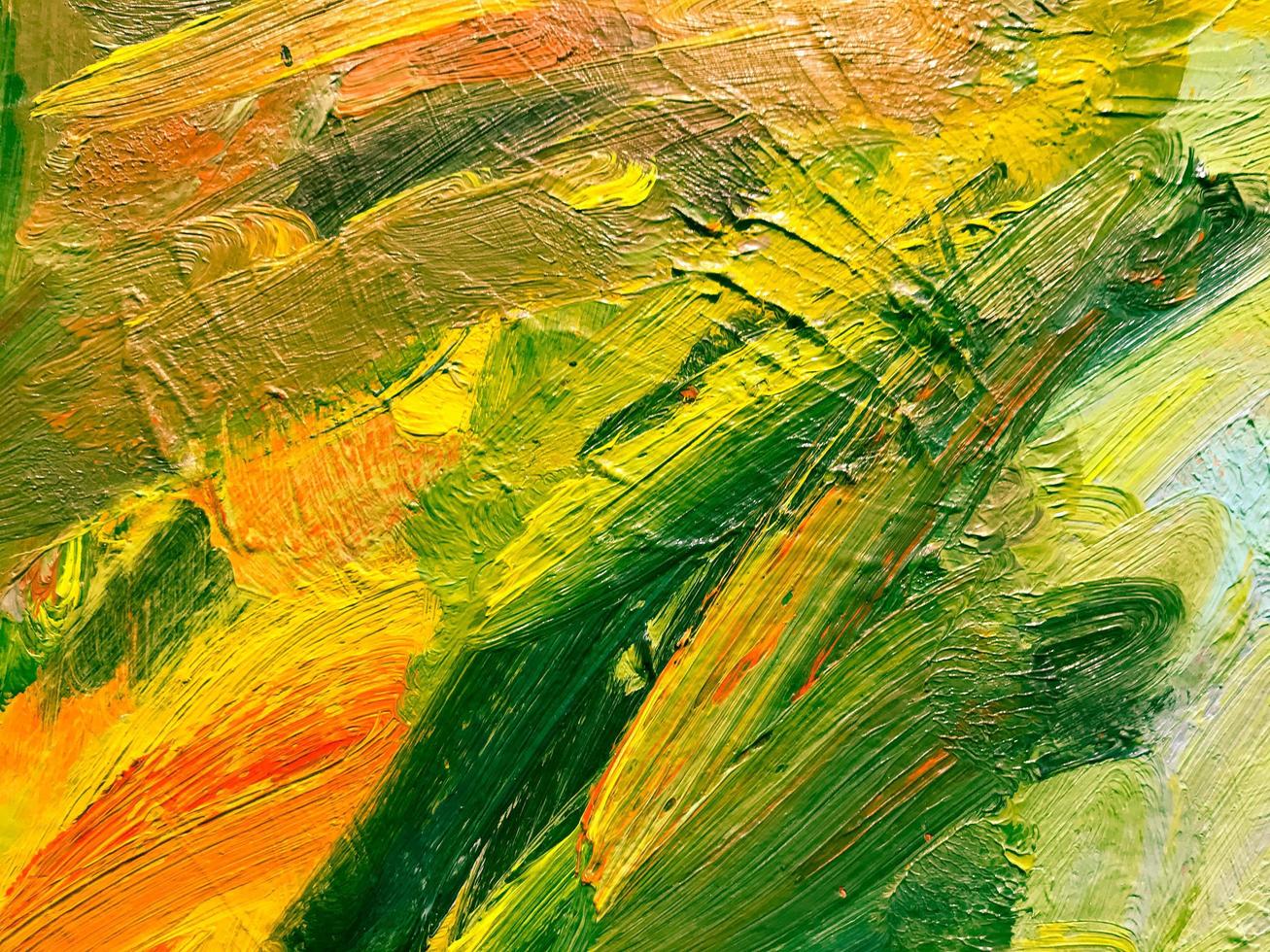 green-yellow texture. application of yellow and green paint on canvas. bright, creative drawing. the texture is heterogeneous, voluminous. waves of paint on canvas. the background photo