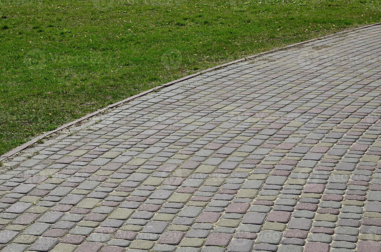 Background photo close-up of a large platform of paving stone in perspective