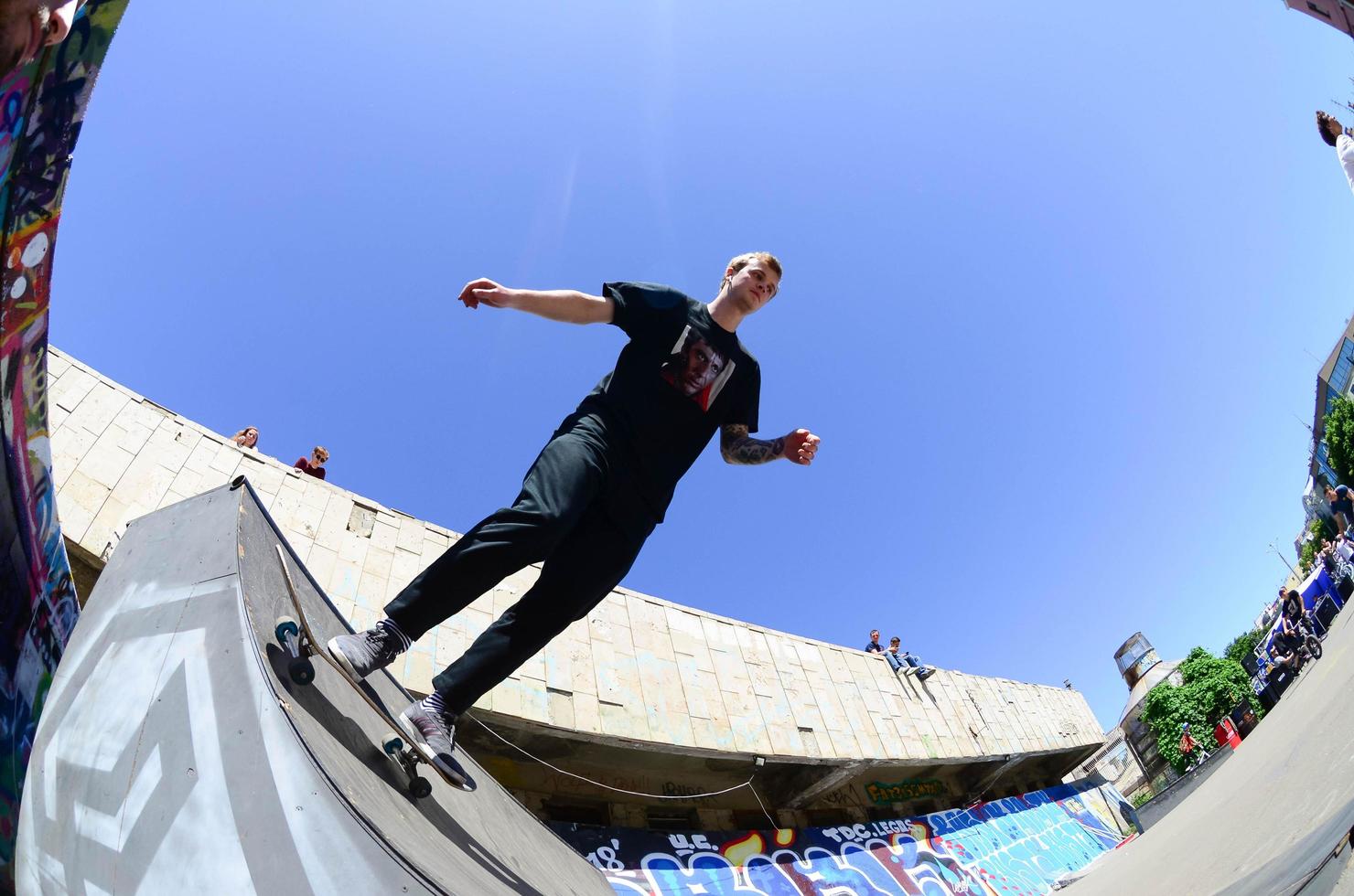 KHARKIV, UKRAINE - 27 MAY, 2018 Skateboarding contest in outdoors skate park during the annual festival of street cultures photo