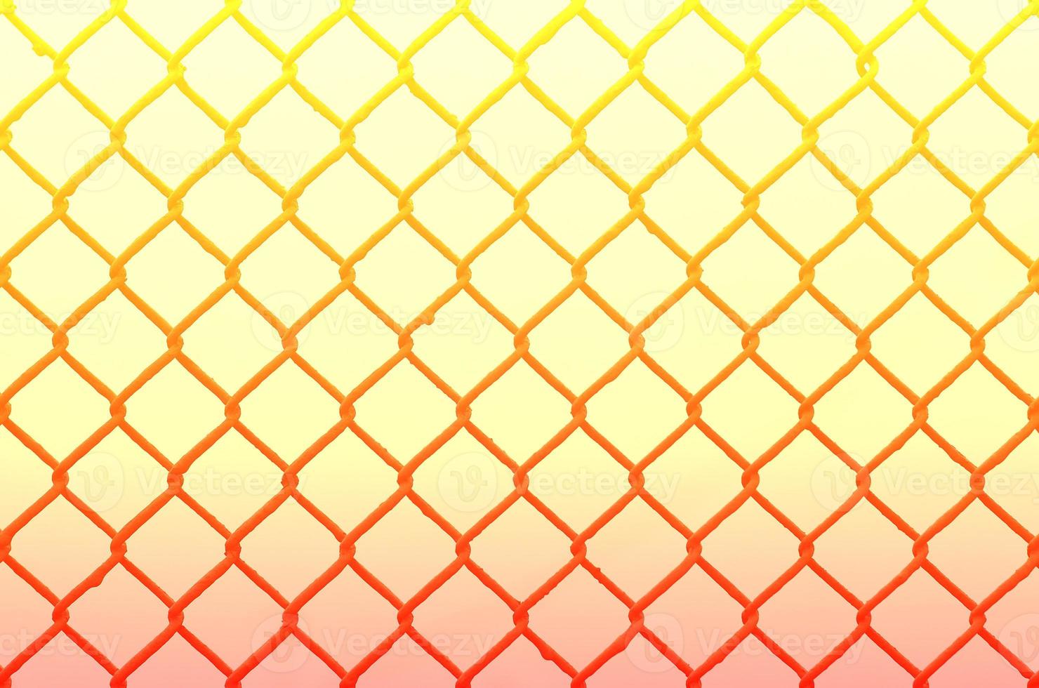 Texture of an old and rusty metal mesh on a neutral colored background photo