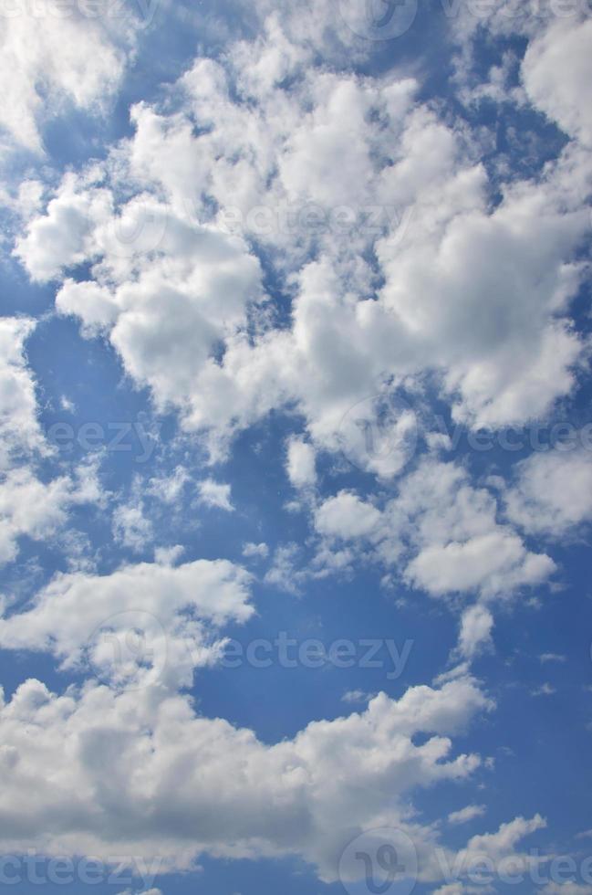 Beautiful blue sky background template with some space for input text message below isolated on blue photo