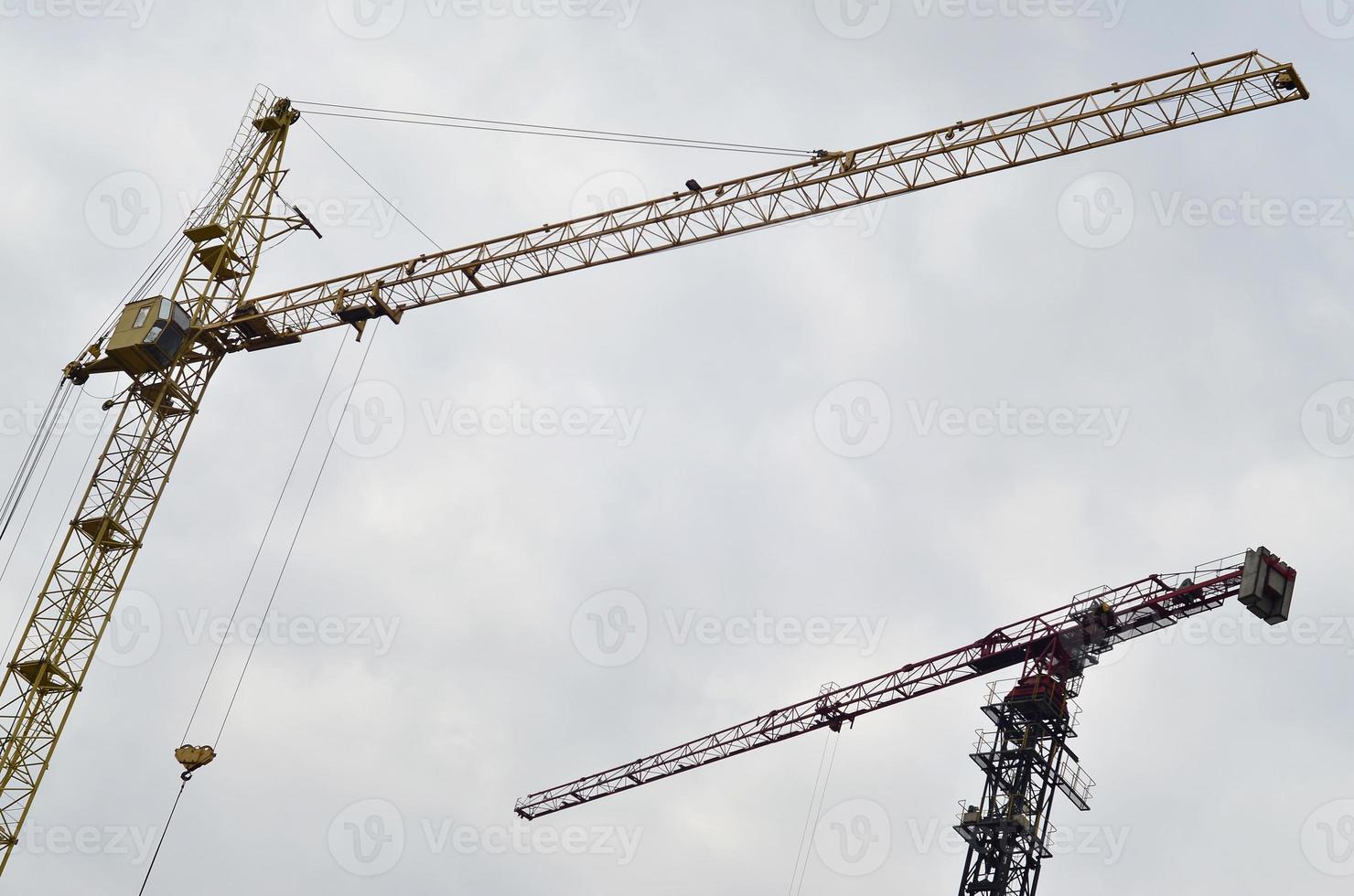 Tower crane against a blue sky photo