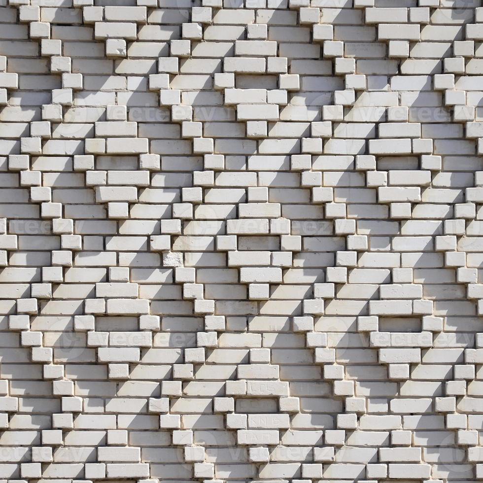 A pattern made of white bricks in the form of diamond shapes. Decoration of the walls during the Soviet Union photo