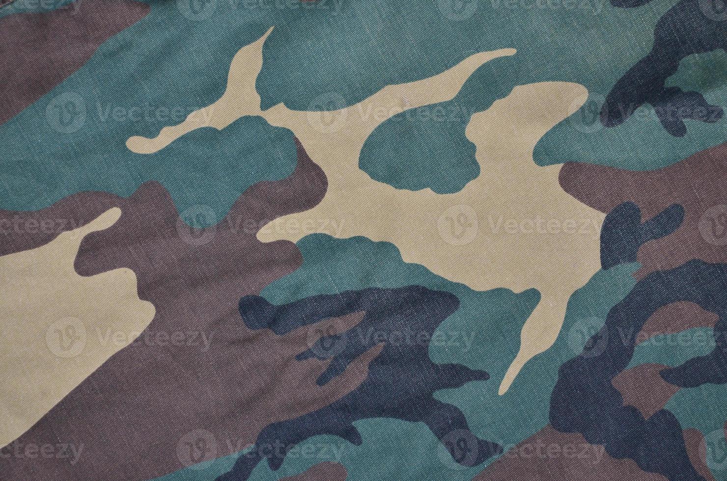 Textile pattern of military camouflage fabric photo