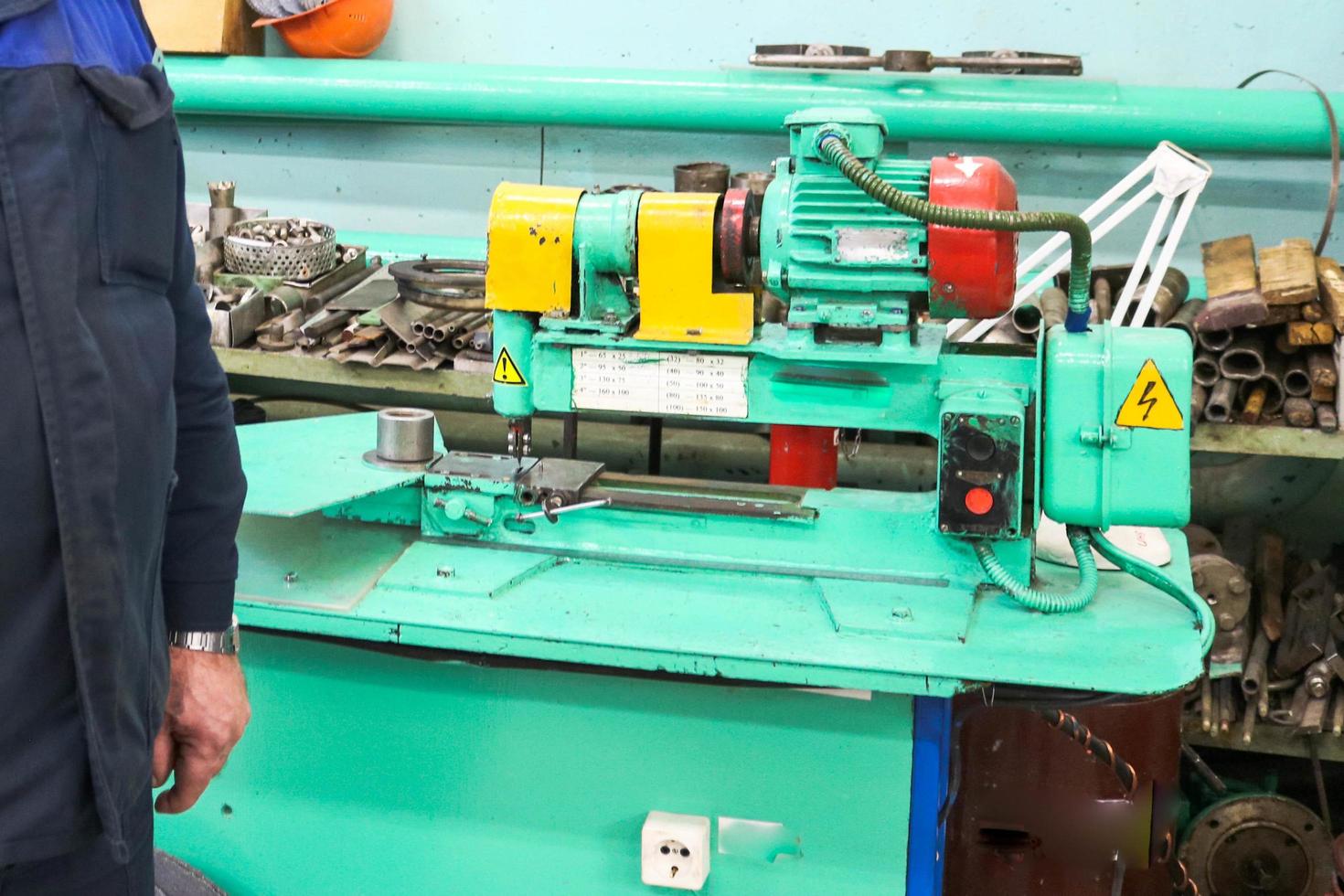 Metallic iron industrial centrifugal centrifugal pump in a metal workshop on the table for the repair and manufacture of parts and spare parts photo