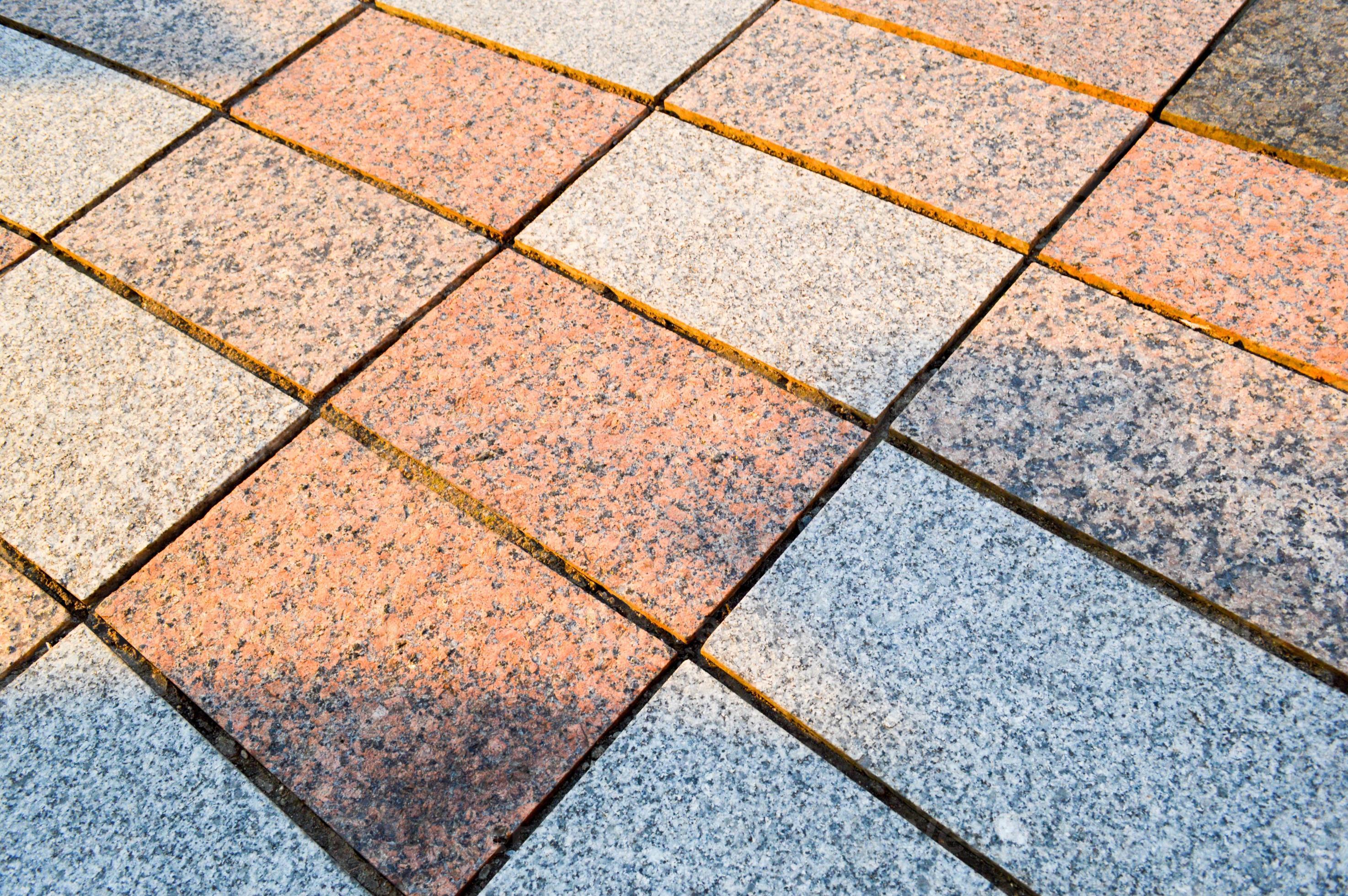 Texture of marble rectangular stone granite tiles with seams on the