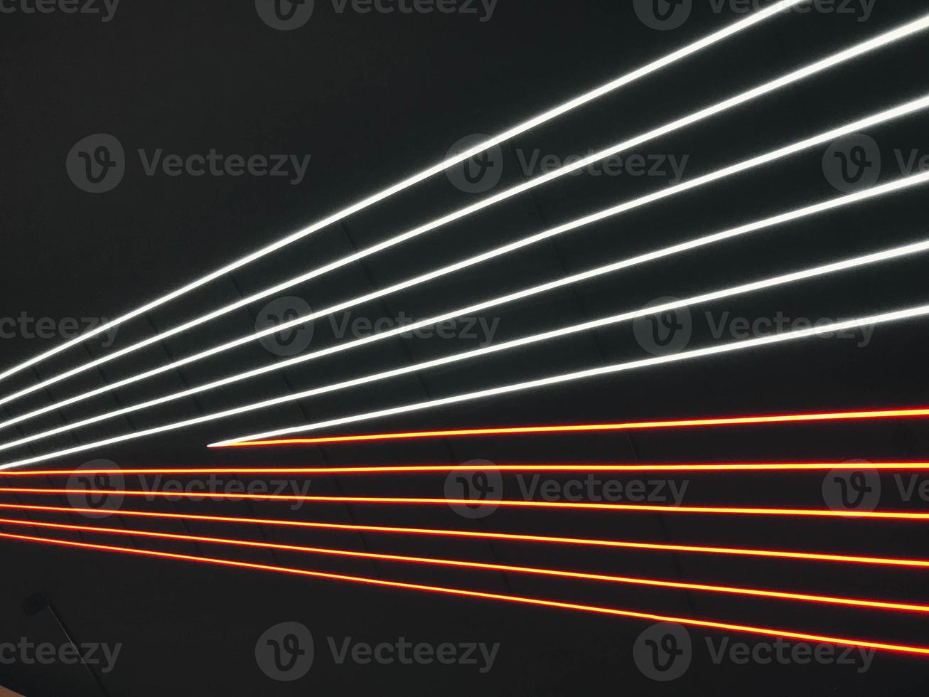 Abstract light rainbow trails in random motion background image. Striped Neon Lights in Rainbow Colors photo