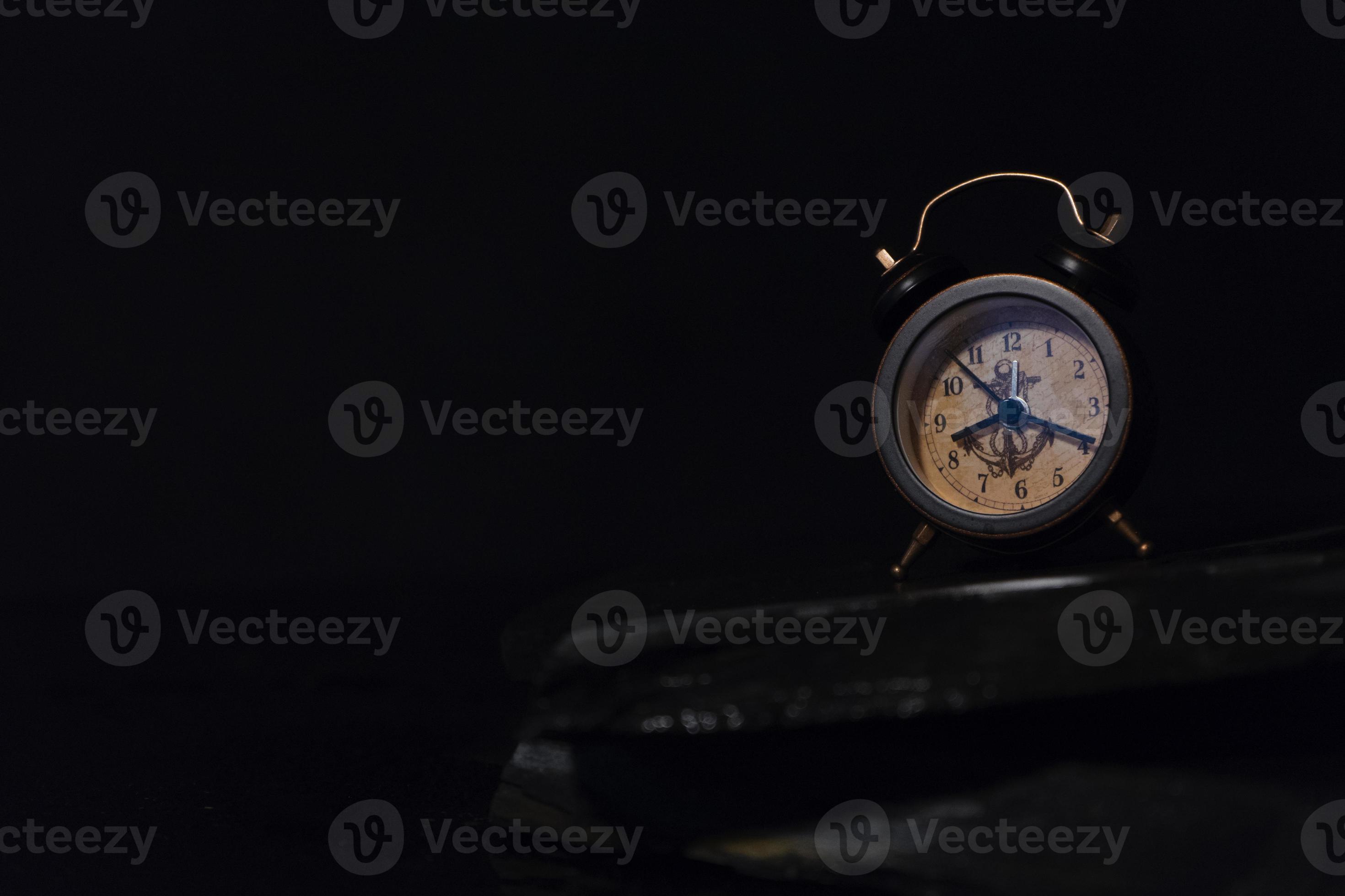 Alarm clock on the shelf 13617837 Stock Photo at Vecteezy