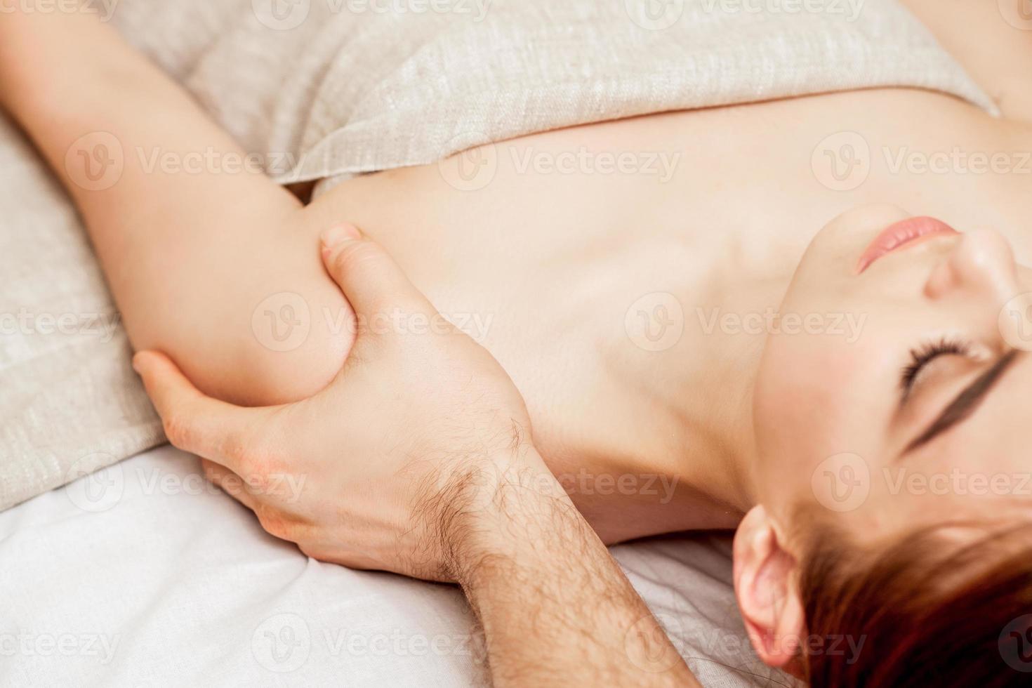 Female shoulder massage. photo