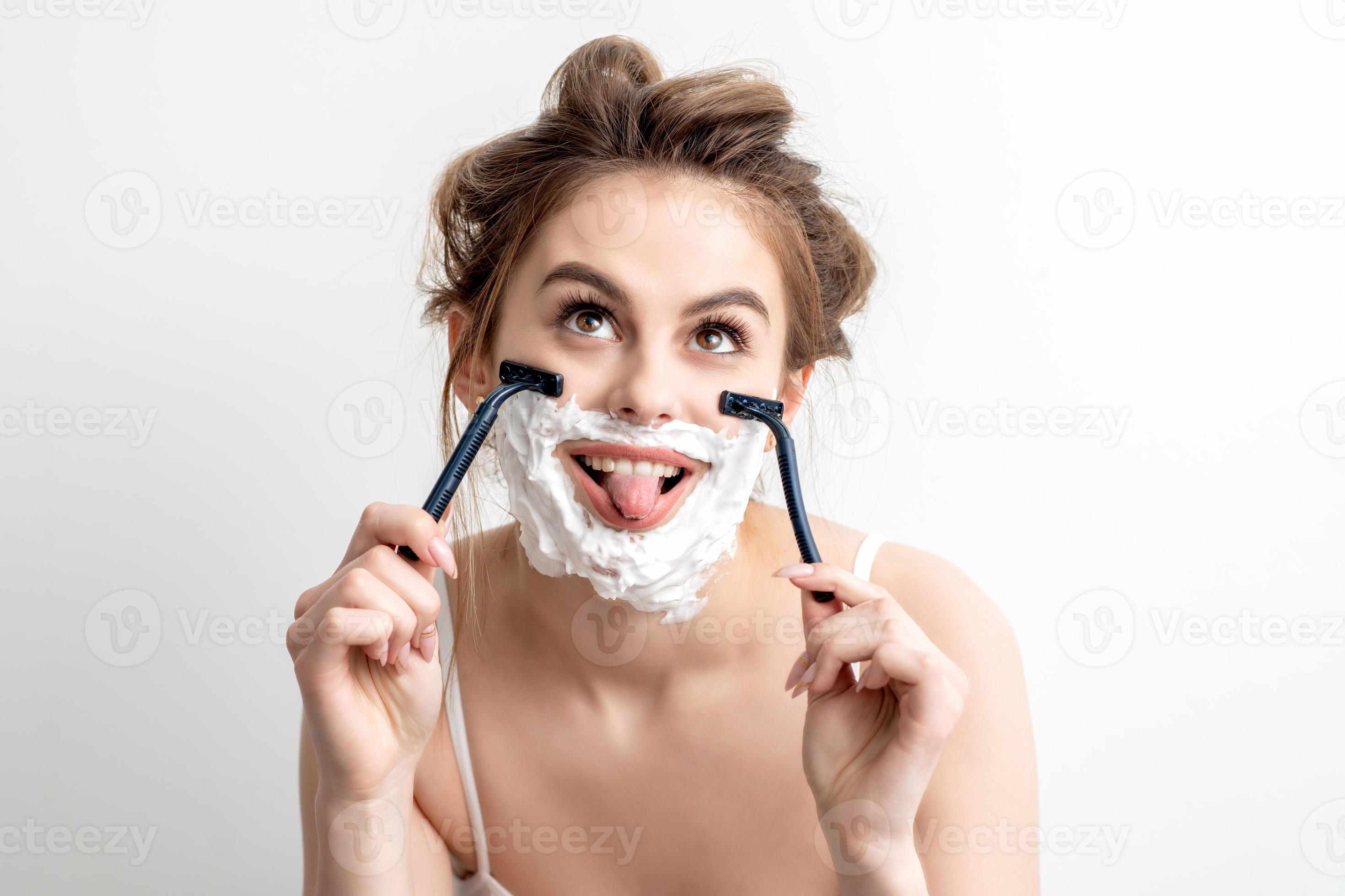 Woman with shaving foam on her face 13618656 Stock Photo at Vecteezy