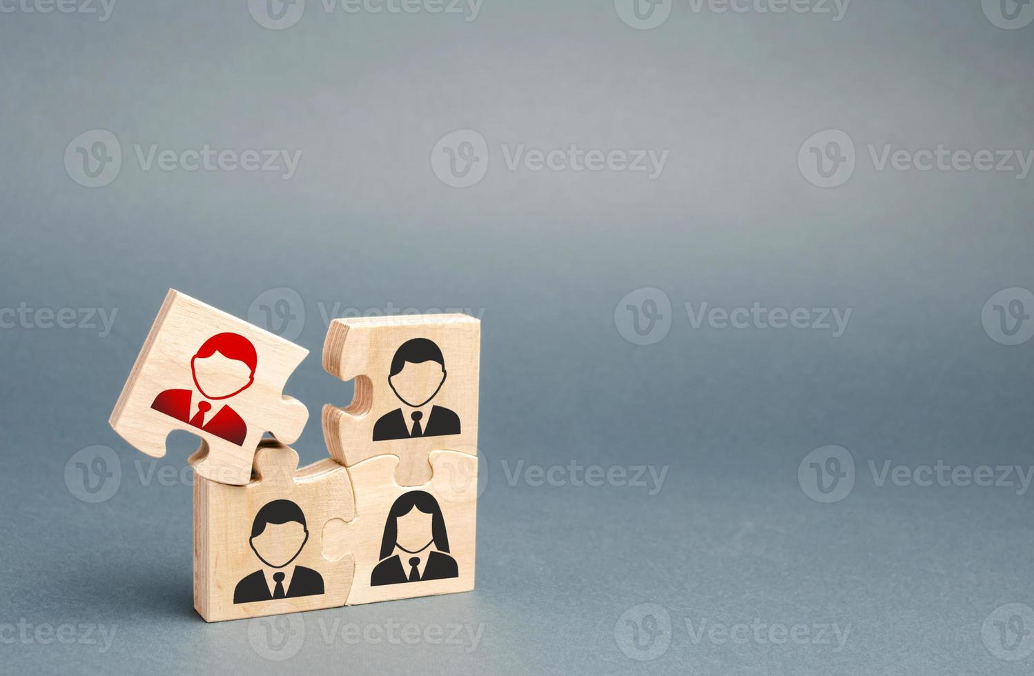 One of the puzzles is disconnected from the overall structure. puzzle with an incompetent and toxic Dismissal of employees, search for new fresh people to work or managerial positions. Management. photo