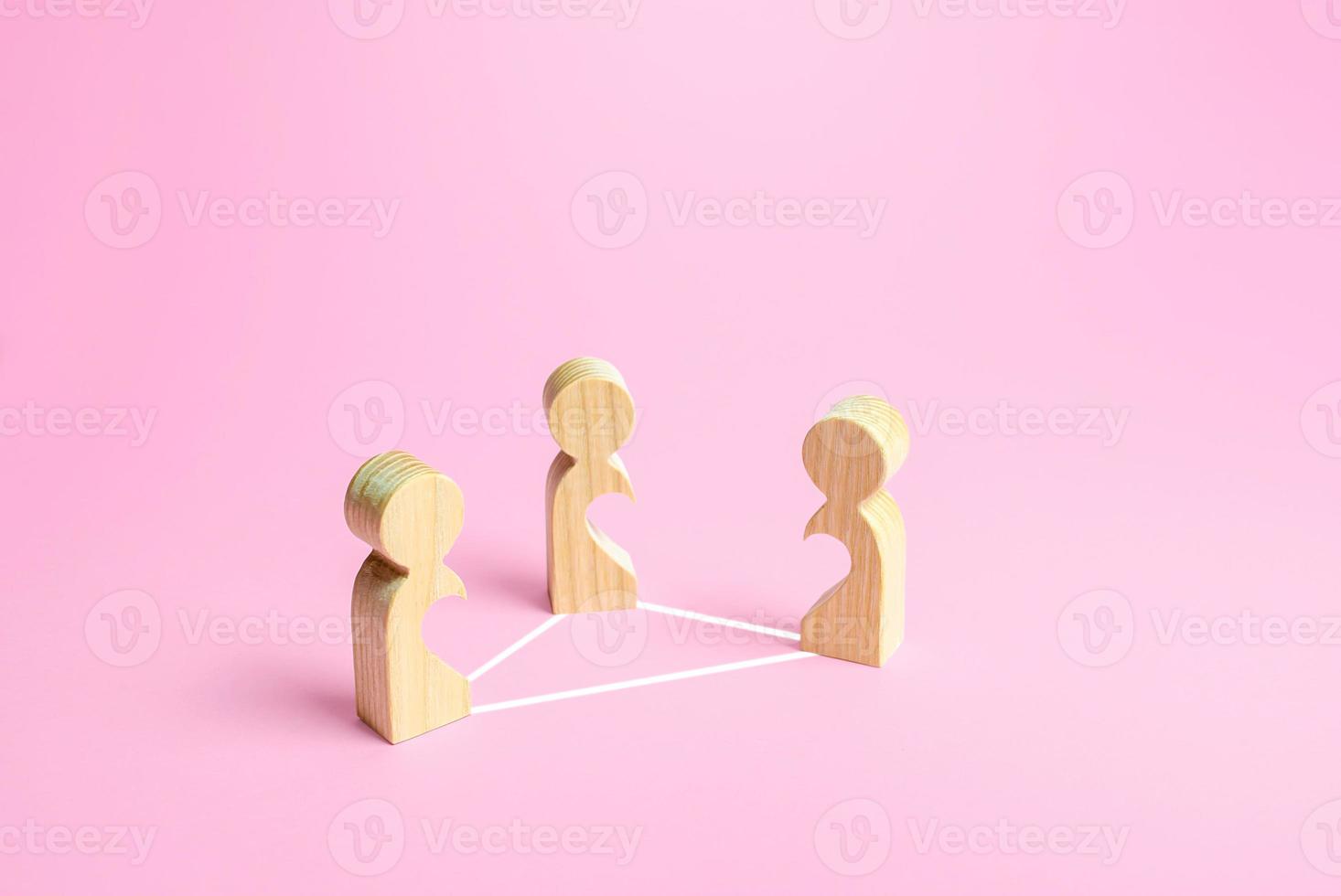 Figures of people in a love triangle. Difficulty in relationships, unrecognized love. Friendzone and conflict. Office romance. Improving personal life, breaking the vicious circle. Psychology photo