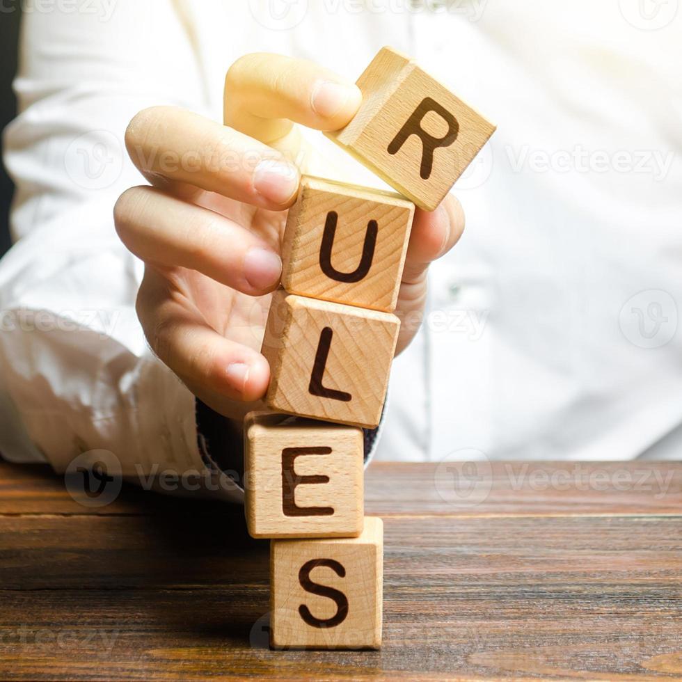 A man breaks the rules. Moral and ethical violations. Go against the law and system, non-recognition of the code of honor. Loopholes laws. Unreliable and dishonest business partner. Unprofessionalism photo