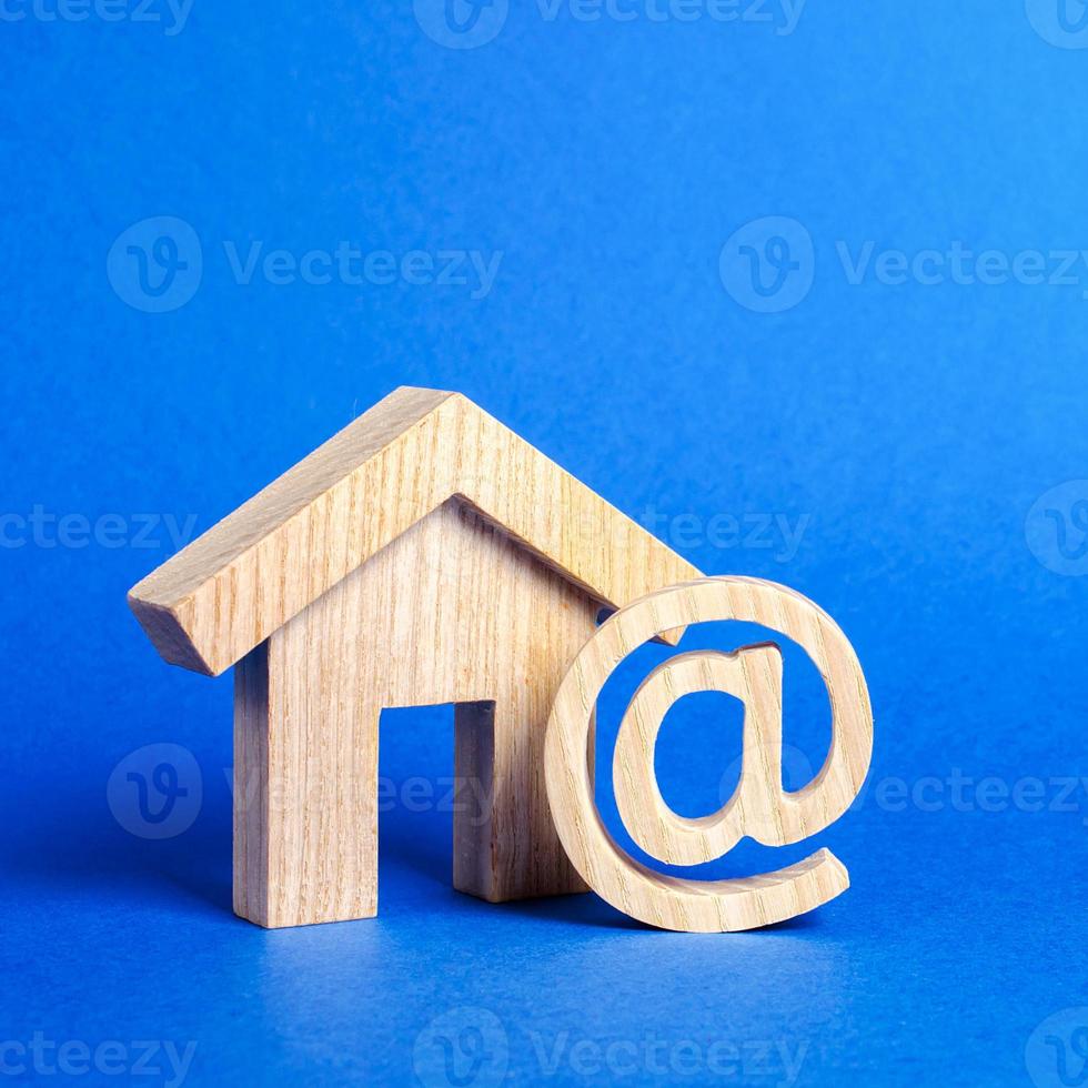 Email icon and house. Contacts for business, home page, home address. communication on Internet. Internet and global communication, digitalization of economy and processes. at commercial photo