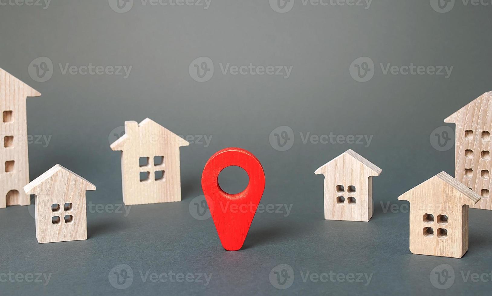Red navigation pointer in a city town. Places and sights. Location routes. Travel, choosing a new place options of residence. Holidays, festivals events. Assessment of infrastructure and environment. photo
