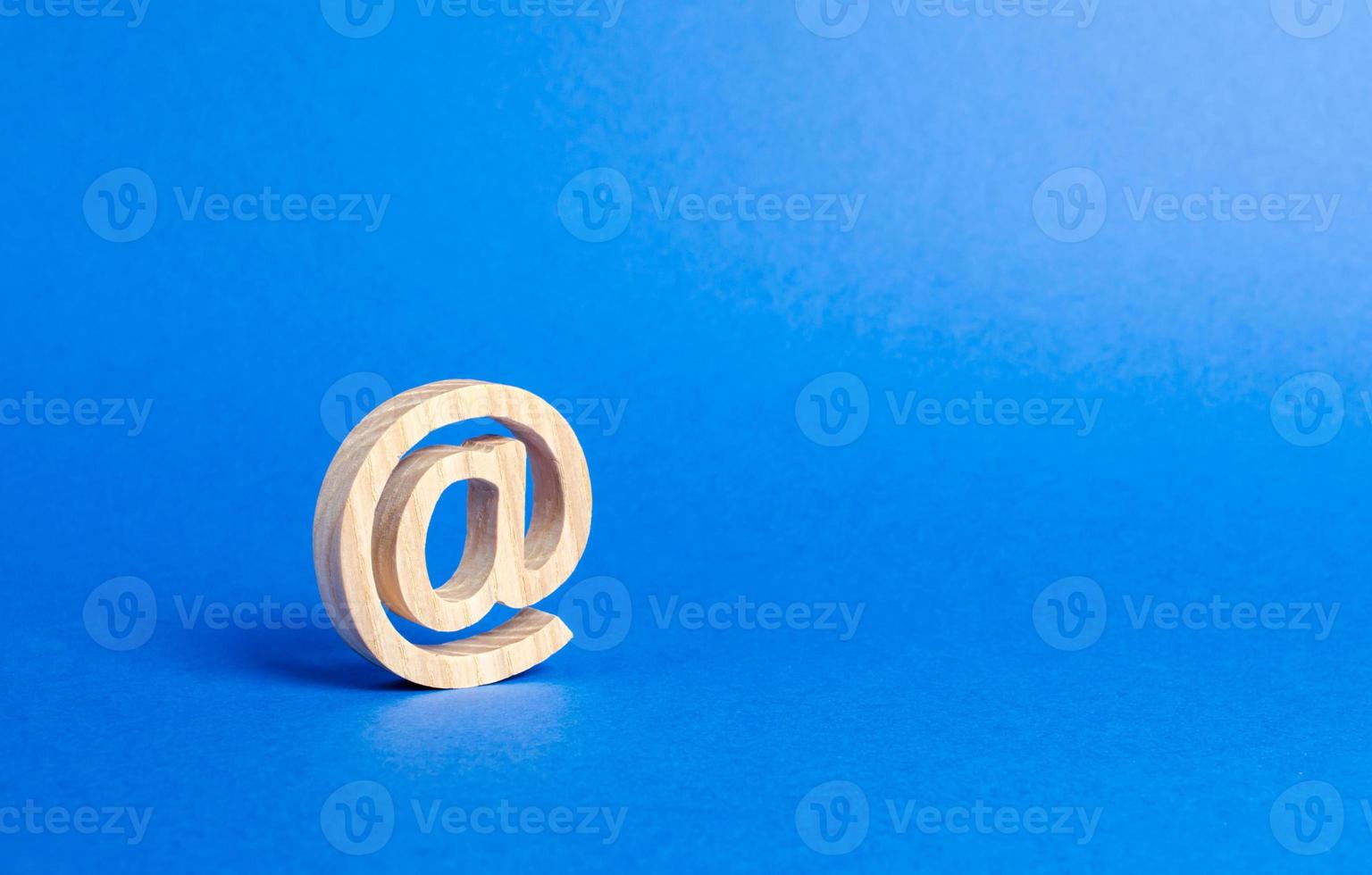 Email icon on blue background. internet correspondence. Contacts for business. Business tools. Internet and global communication, digitalization of economy and processes. at commercial photo