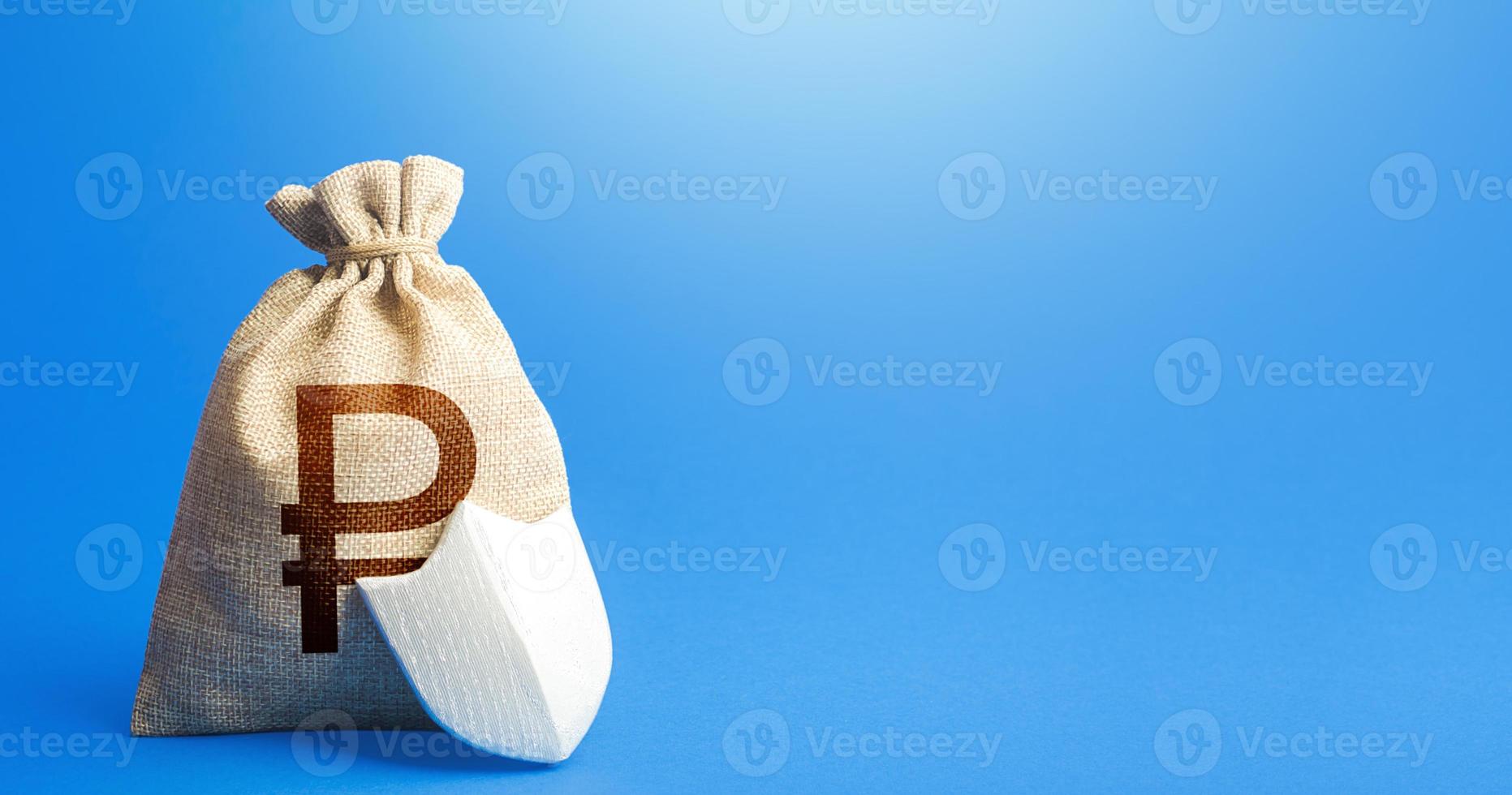 Russian ruble money bag and protection shield. Ease doing business. Strength of financial system. Sustainable banks. Fixed interest deposit. Guaranteed deposits compensation. Investment safety. photo