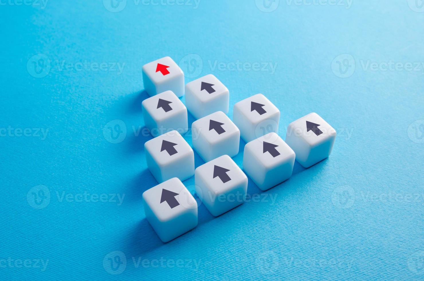 Blocks with arrows pointing in the same direction. Movement in a single group. Consolidation into a larger formation. Common interest, join for problem solving. Cooperation and teamwork. Planning photo