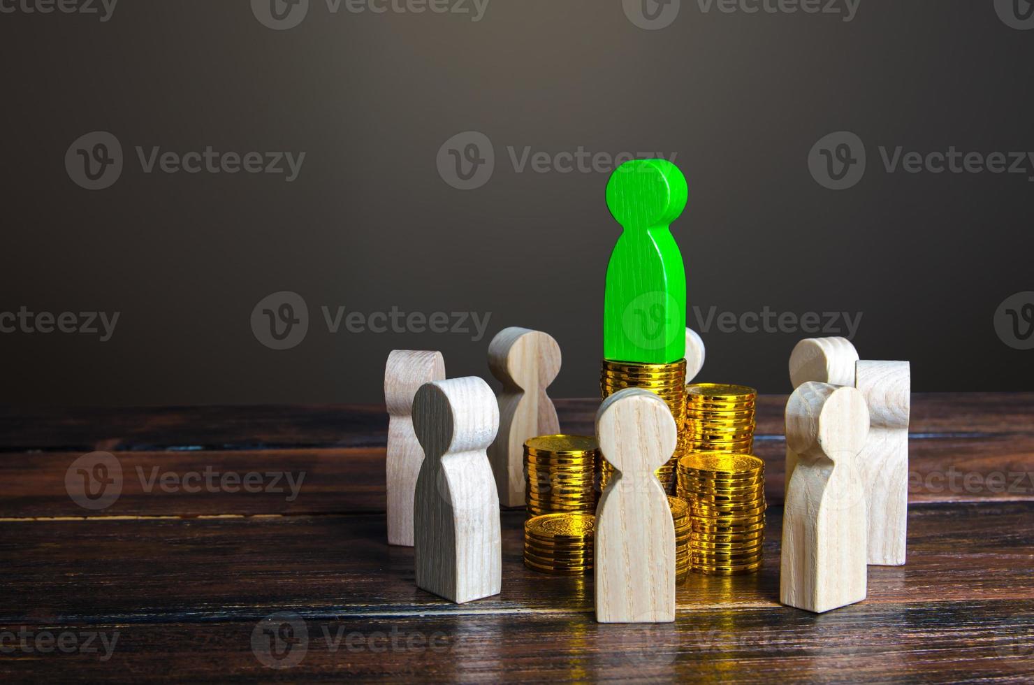 The leader on the stacks of coins attracts people. Financial independence. Enrichment and increase of capital. Attract followers with your success. Distribute loans. Investment. Get rich. Envy. photo