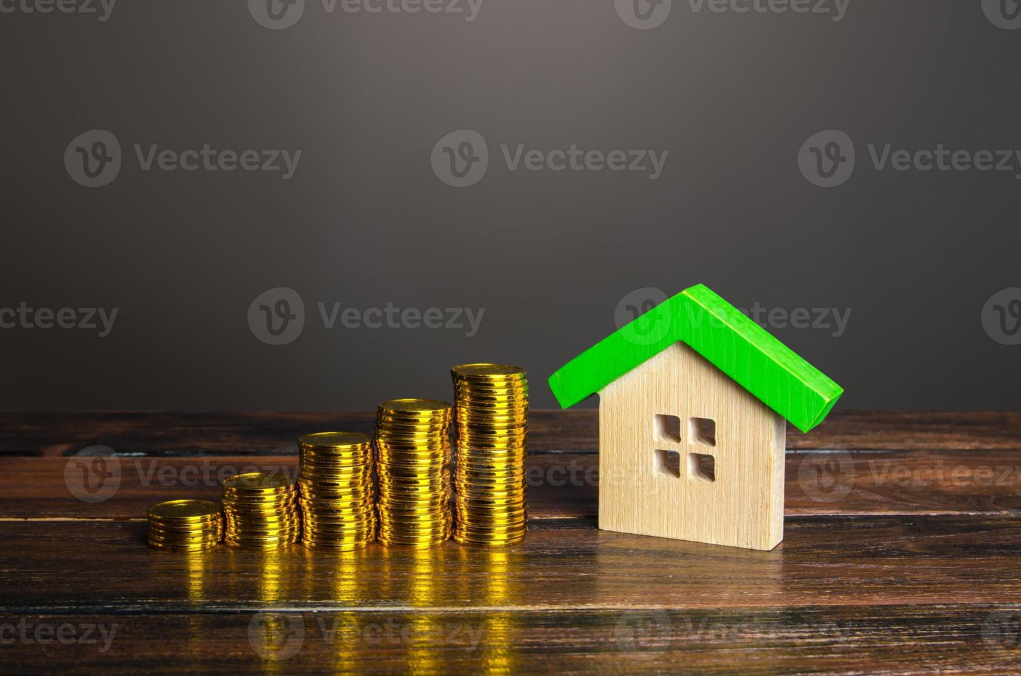 Houses and increasing stacks of coins. Property value growth. Fair