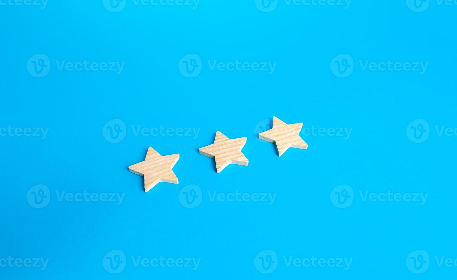 Three rating stars. Rating evaluation concept. Service quality. High satisfaction. Popularity of a restaurant, hotel or mobile applications. Good reputation status. Buyer feedback. photo