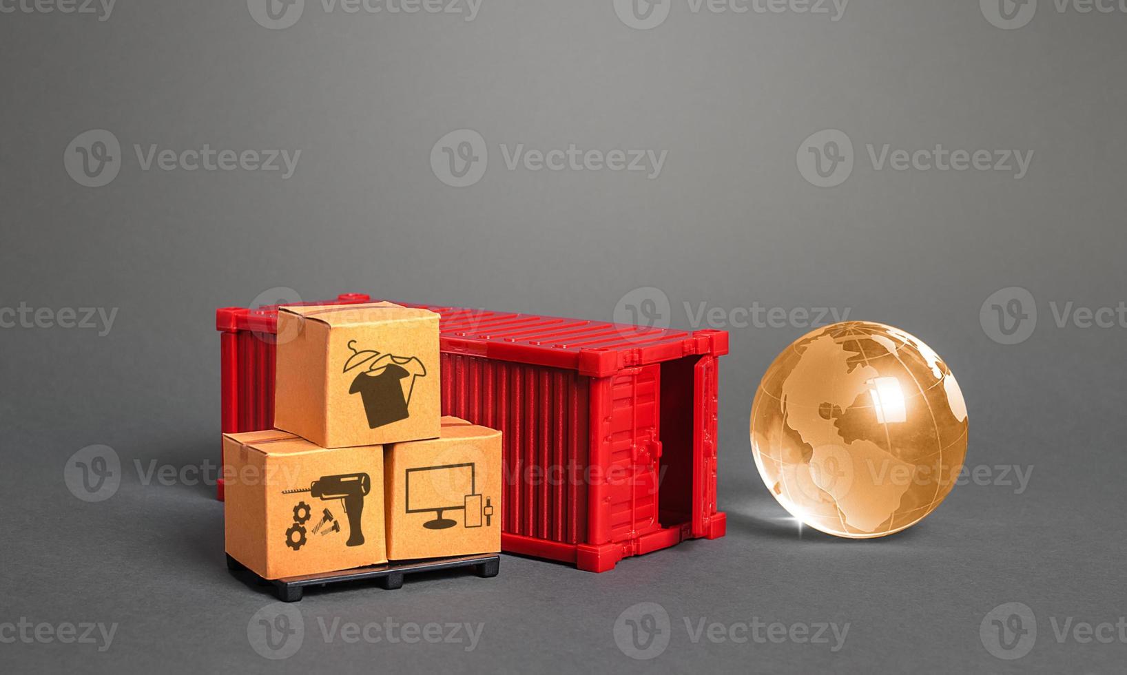 Orange globe, cardboard boxes and red freight ship container. International world trade. Deliver goods, shipping. Import export traffic. Delivery goods under closed borders, quarantine restrictions. photo
