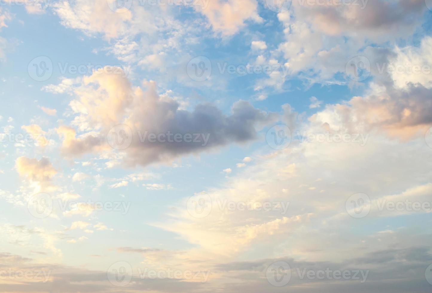 Beautiful view of the morning white clouds in the blue sky. Peach beige color clouds. Homosphere. Sunrise. The concept of feelings of peace and dimension. The beauty of nature elements photo