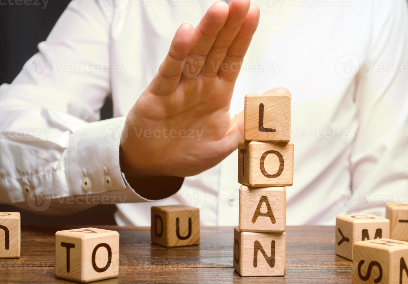 The businessman refuses expensive and risky loans. Business management and investment search. The bank refuses to issue a loan, the client's credit history. investment in development. photo