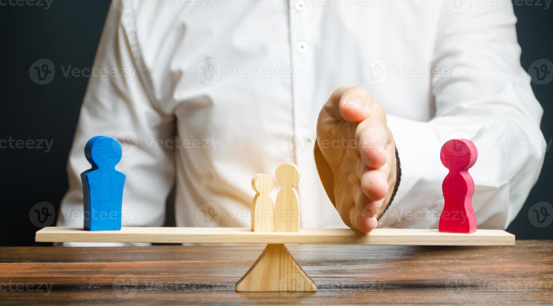 A man with a palm separates children from mother to father. Depriving a mother of parental rights and transferring children under guardianship. Child custody after divorce. Conflict between parents photo