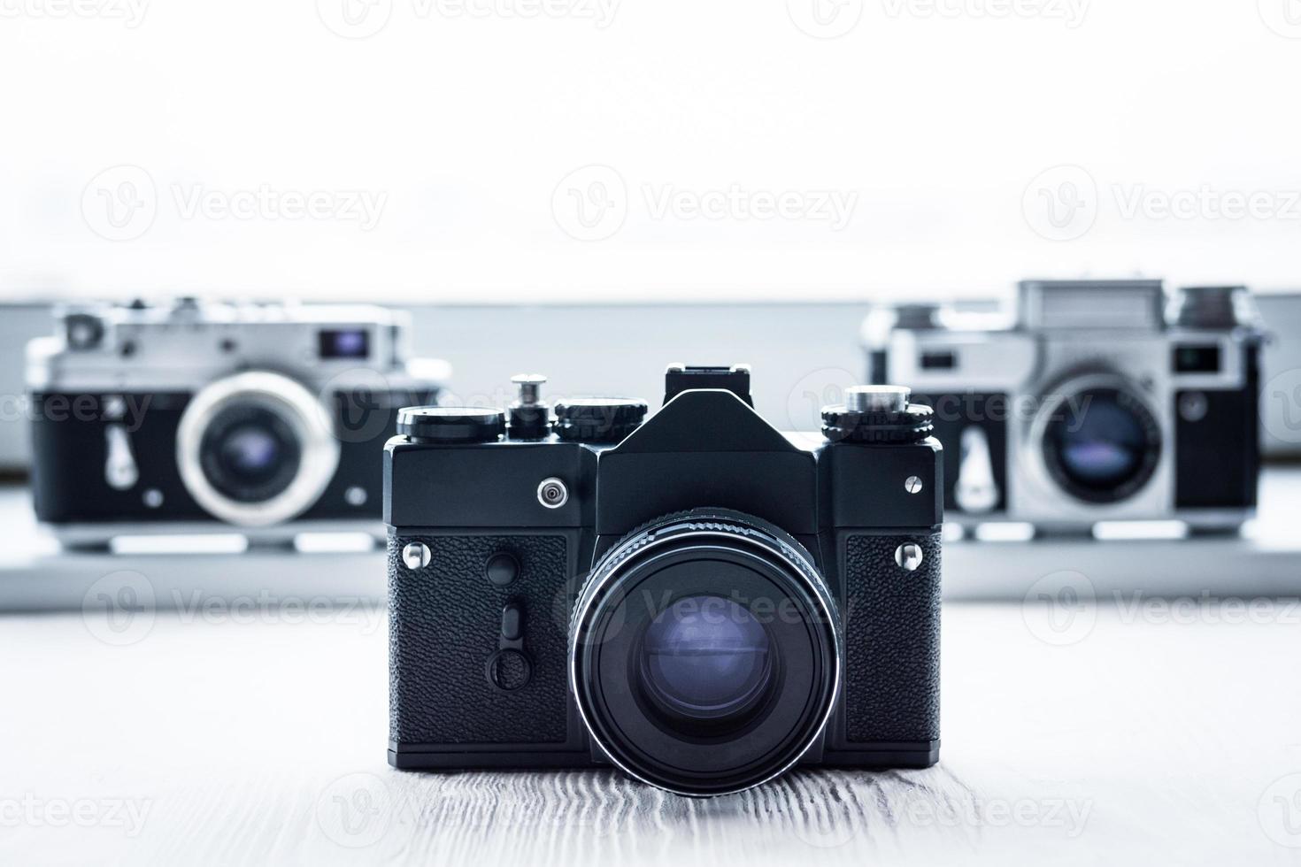 retro cameras on white background photo