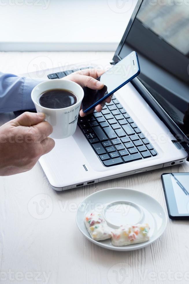 man behind laptop photo