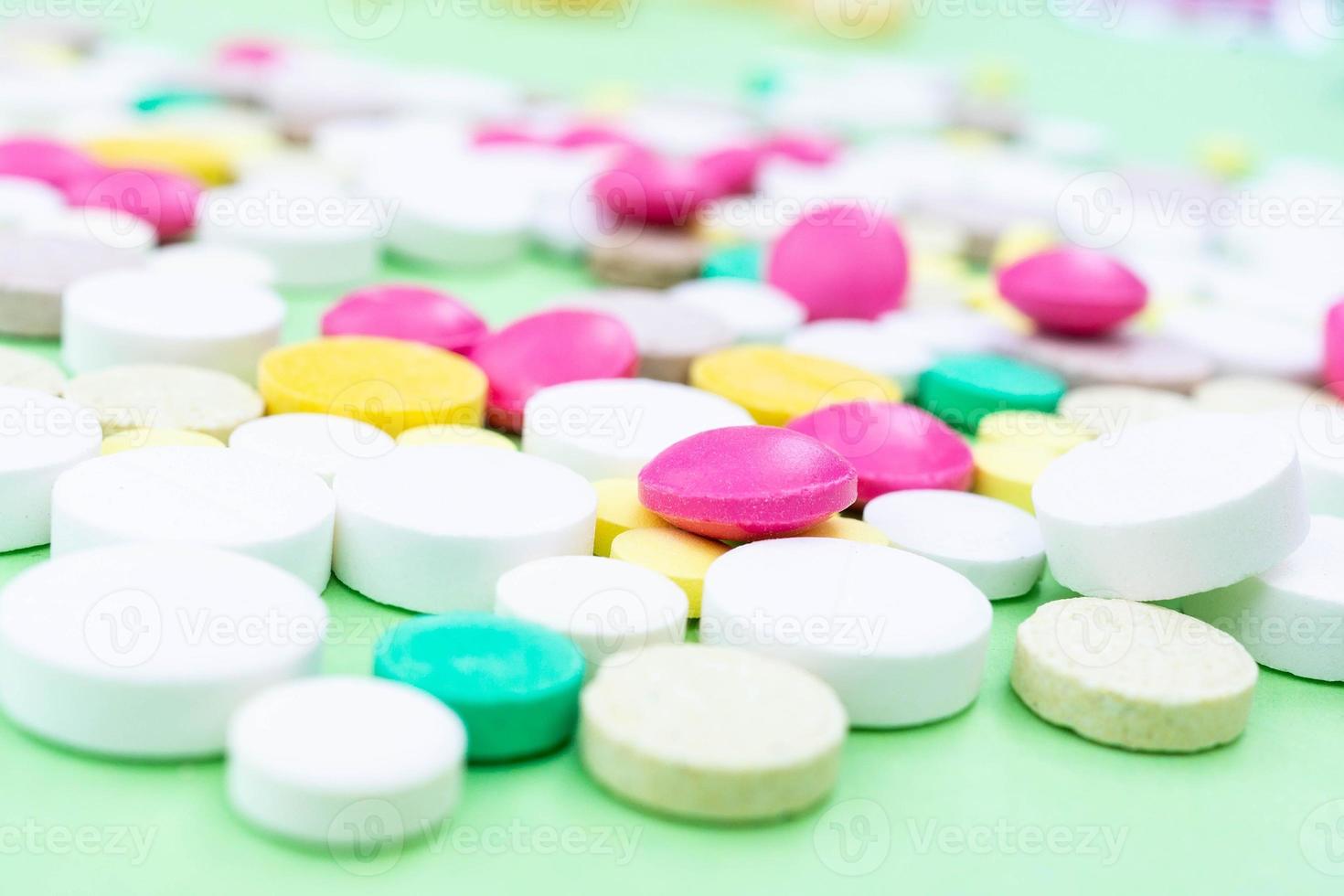 pills on a green background photo