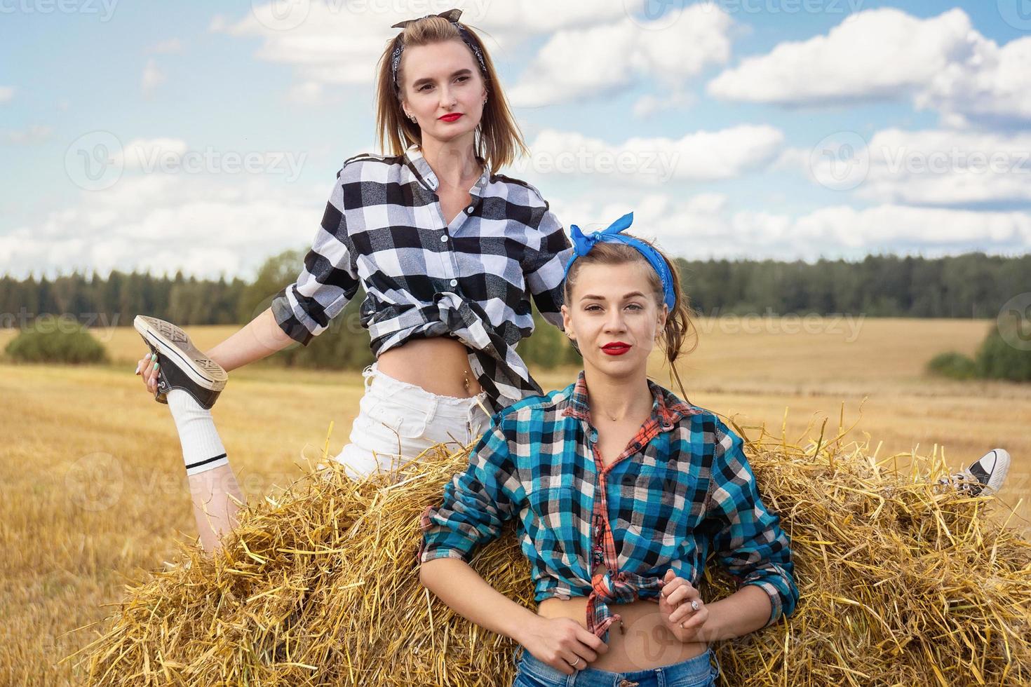 girl on a sheaf of hay photo