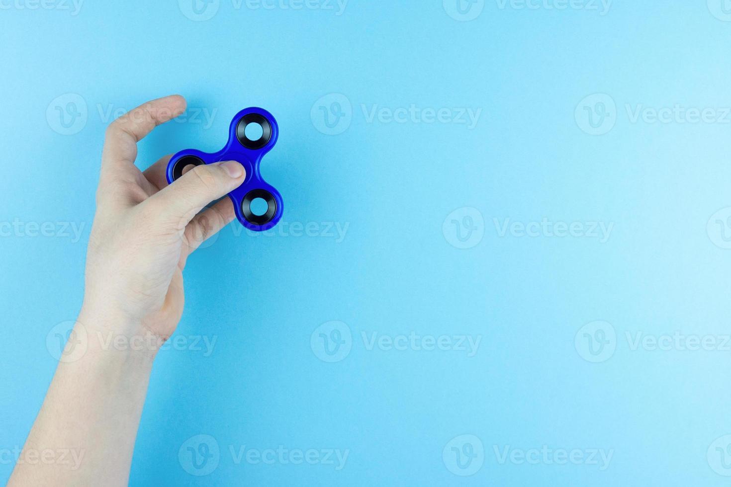 spinner in hand photo