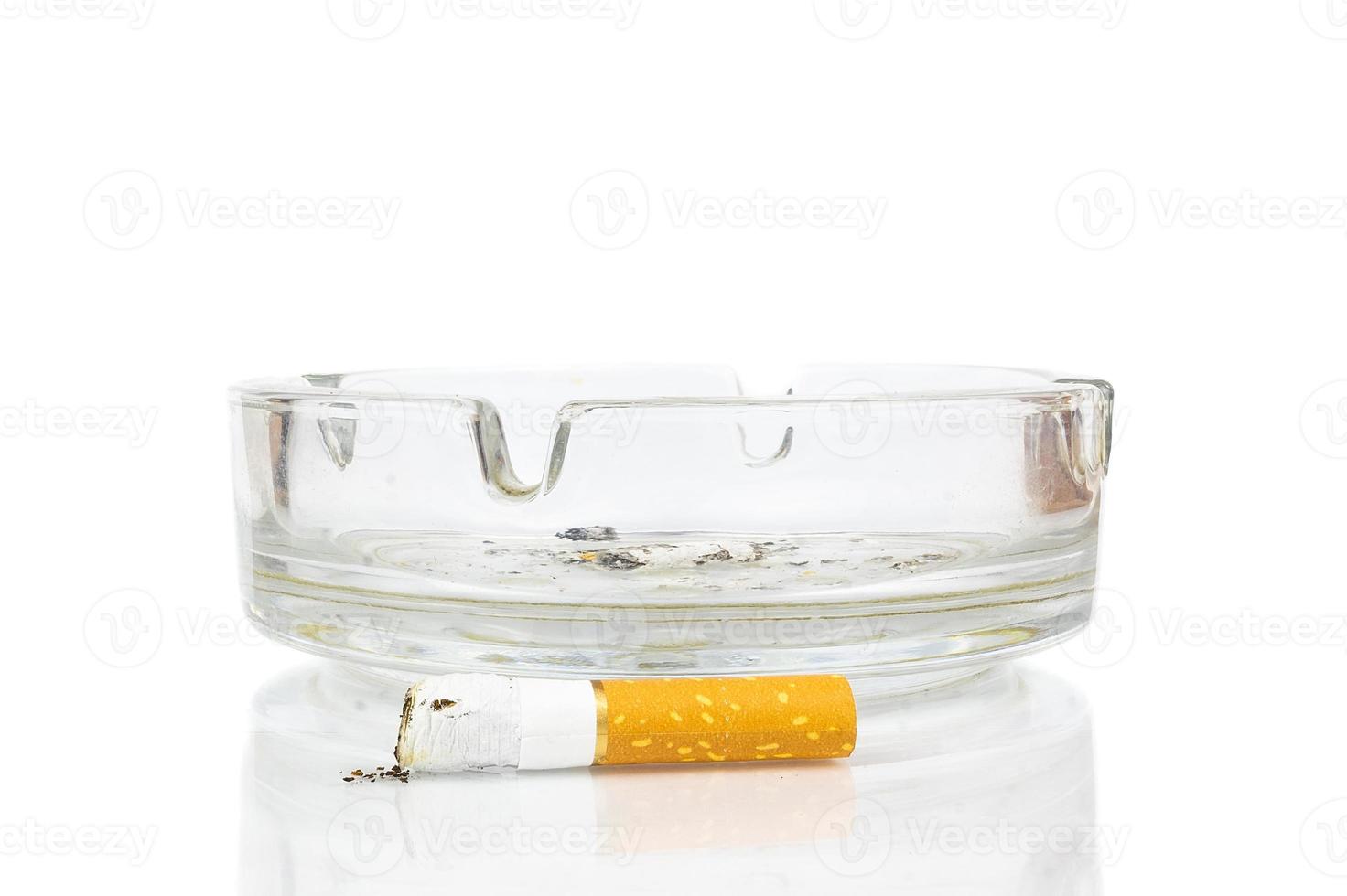 cigarette butt in the ashtray photo