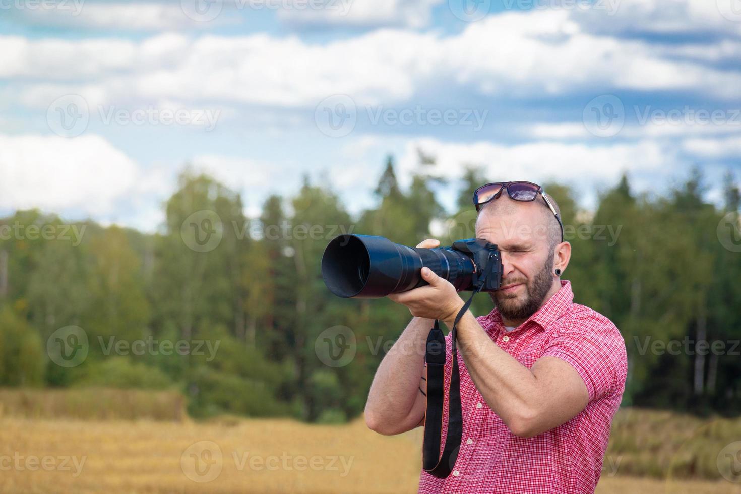 fotógrafo en la naturaleza foto